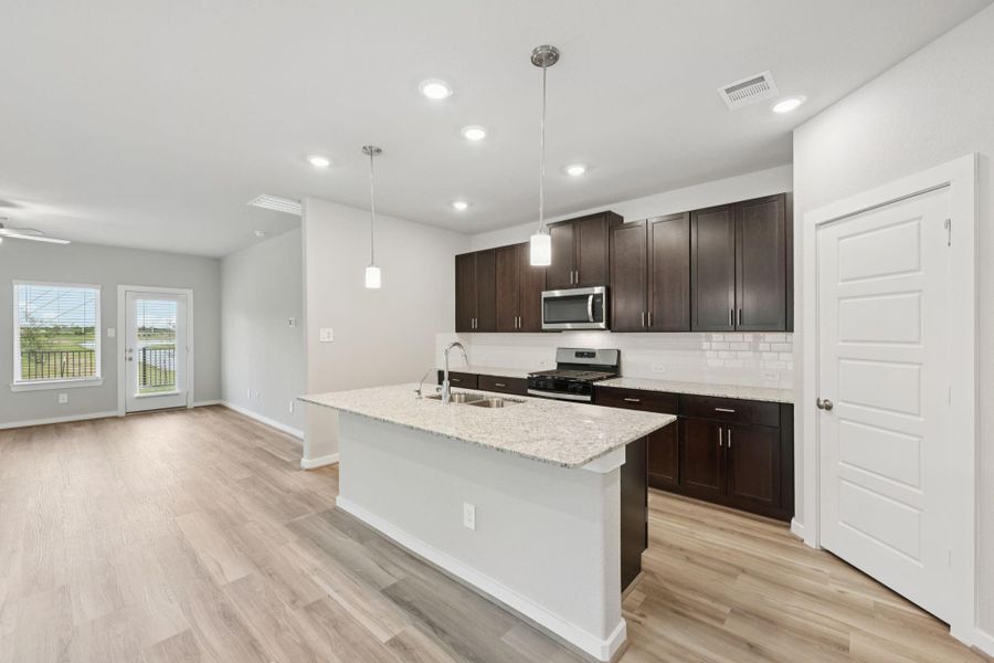 Furnished interior view inside a new home in Heights of Barbers Hill, Mont Belvieu (Image 5).