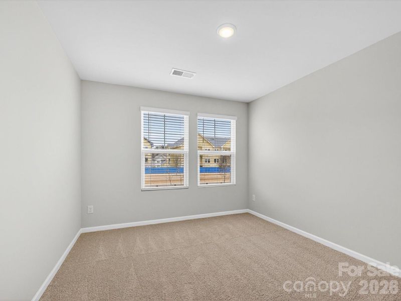 Spacious, unfurnished interior of a new home in North Creek Village, Huntersville (Image 27).