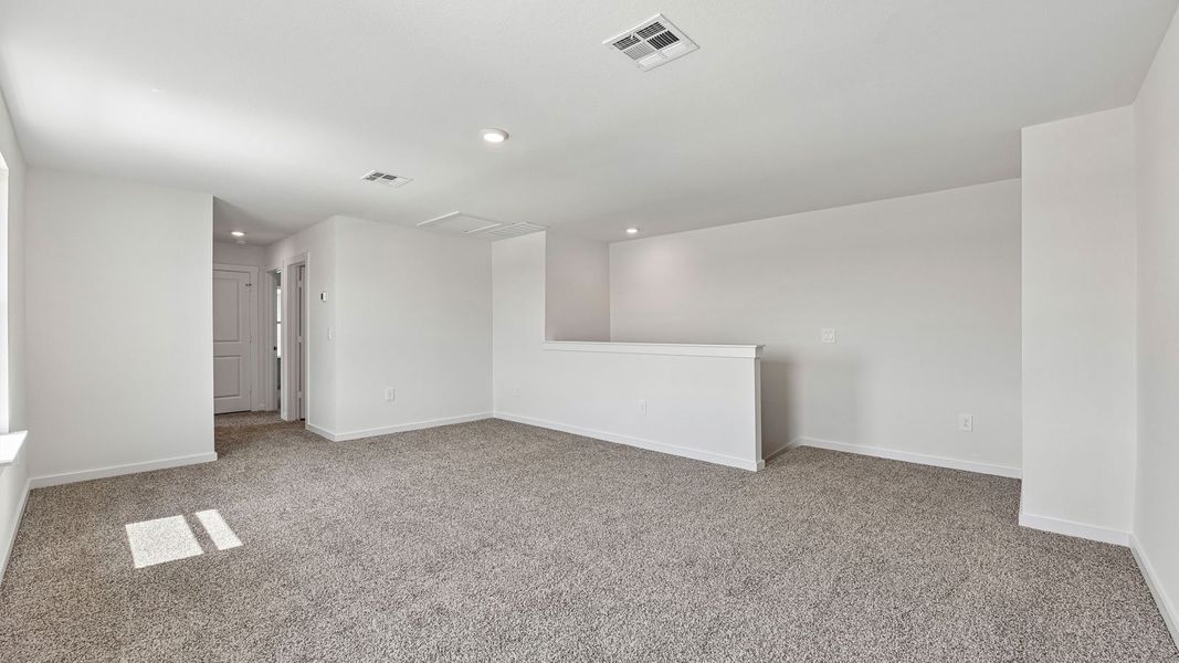 Spacious, unfurnished interior of a new home in Monarch Ranch, Manor (Image 42).