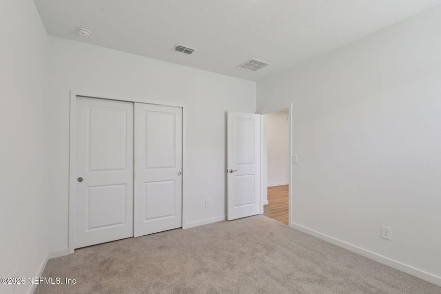 Spacious, unfurnished interior of a new home in Colbert Landings, Palm Coast (Image 20).
