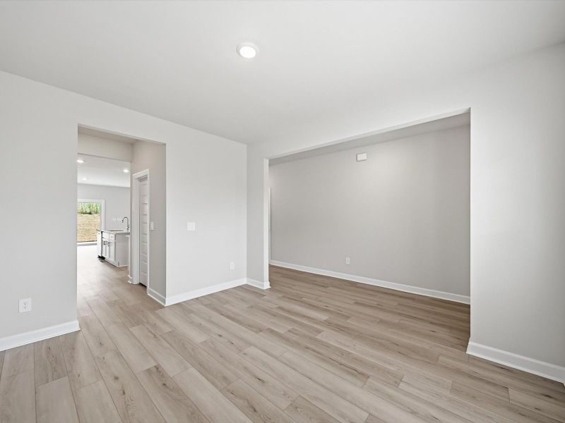 Spacious, unfurnished interior of a new home in The Farm at Wells Creek - Signature Collection, Gray Court (Image 10).