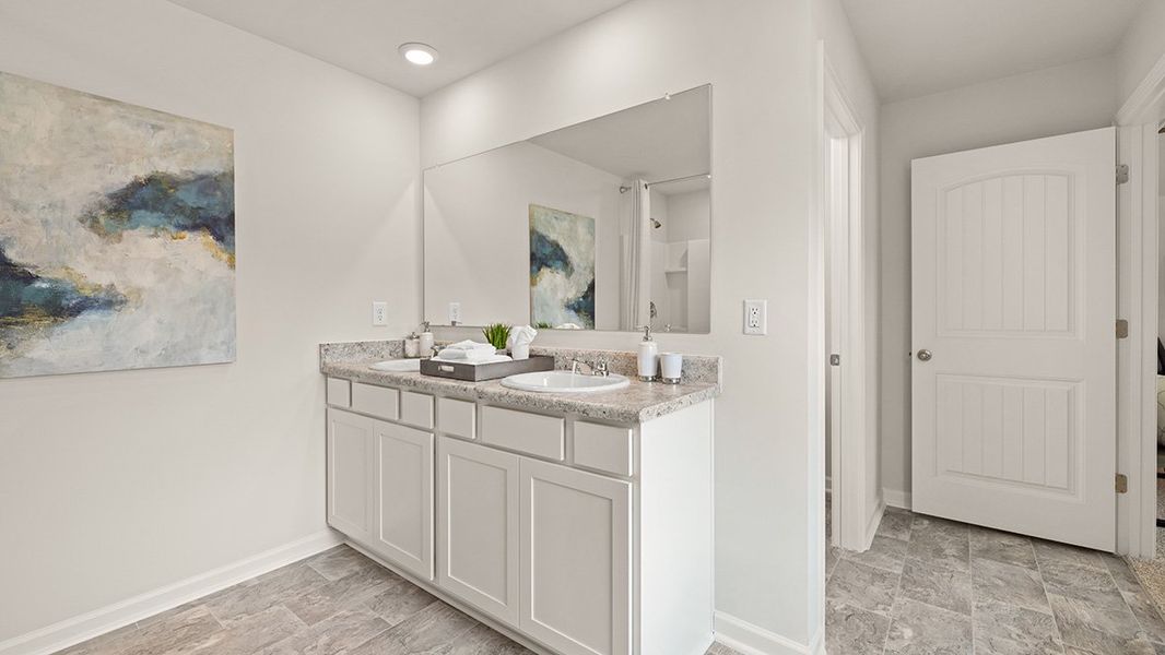 Representative furnished interior of a home built from the Flora by D.R. Horton in Sheffield Highlands, Dallas (Image 25).