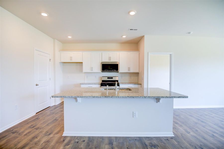 Representative furnished interior of a home built from the ARIA by D.R. Horton in West New Bern, New Bern (Image 5).