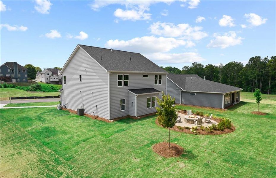 Exterior details and patio area of a home in Watermist at Mirror Lake, Villa Rica (Image 26).