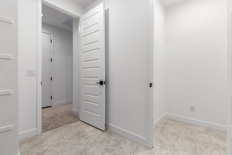 Spacious, unfurnished interior of a new home in Estrella, Goodyear (Image 18). Spacious, unfurnished interior of a new home in Estrella, Goodyear (Image 18).