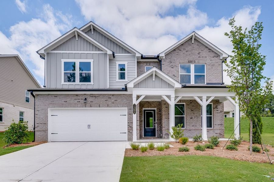 Front exterior of a new home in Windance Lake, Loganville, GA, highlighting curb appeal (Image 23).