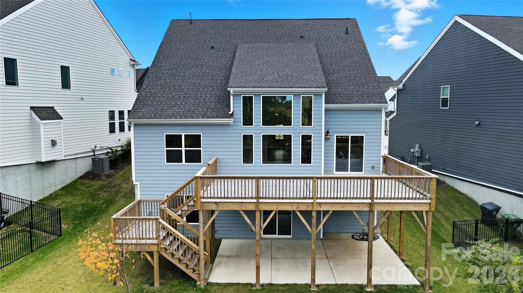 his gorgeous home is perfectly positioned to maximize outdoor enjoyment, featuring a fabulous deck, a covered patio, and a private floating dock—ideal spots for outdoor entertaining or simply soaking in the serene lake scenery