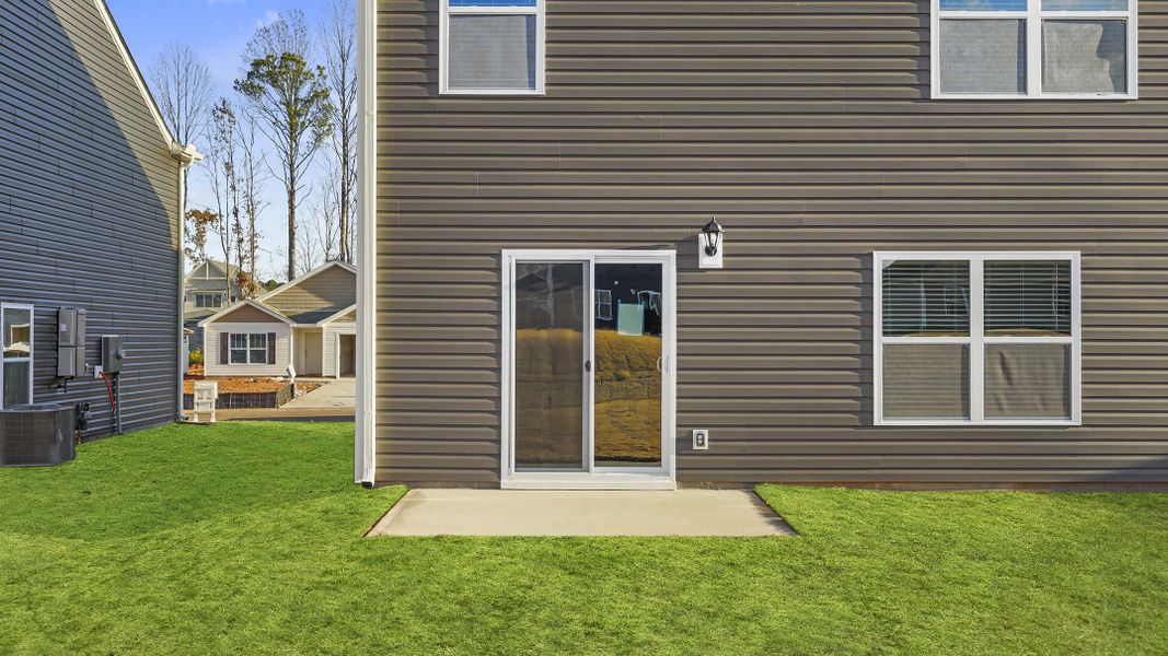 Exterior details and patio area of a home in Bentley Park, Greenwood (Image 20). Exterior details and patio area of a home in Bentley Park, Greenwood (Image 20).