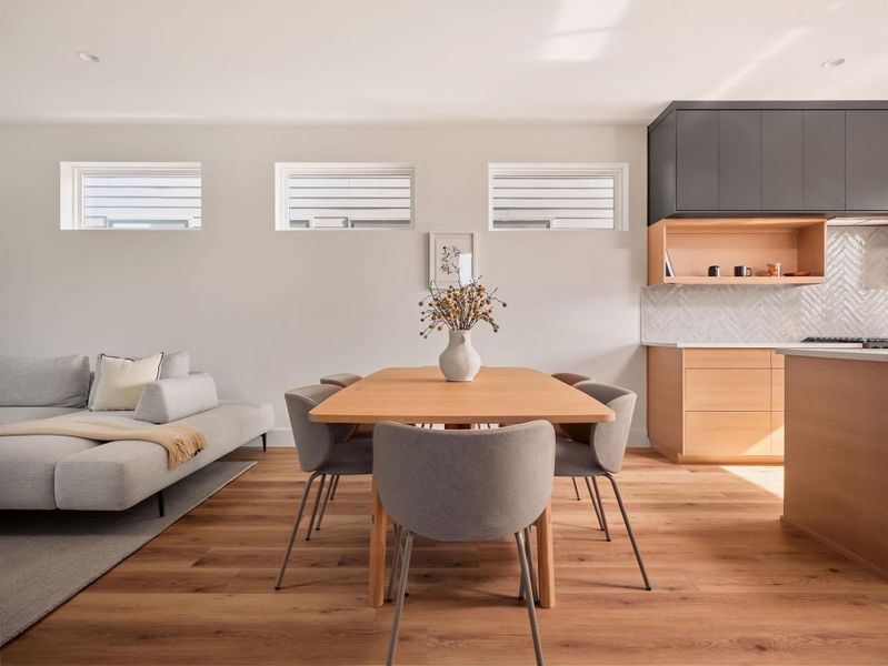 Dining space with light wood-style flooring