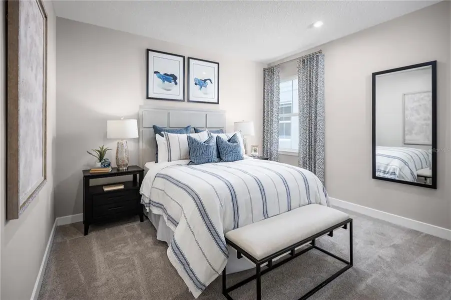 Furnished interior view inside a new home in The Palms at Venetian Bay, New Smyrna Beach (Image 9).