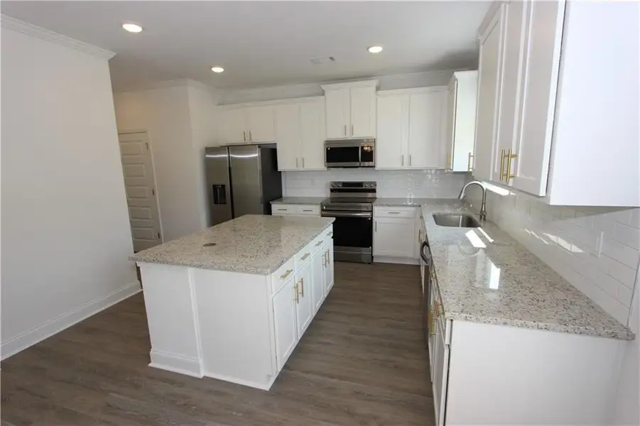 Furnished interior view inside a new home in Clark Farms, Flowery Branch (Image 4).