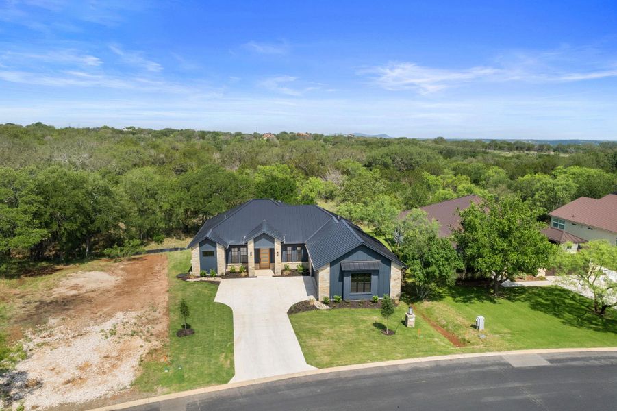 Front exterior of a new home in , Horseshoe Bay, TX, highlighting curb appeal (Image 20).