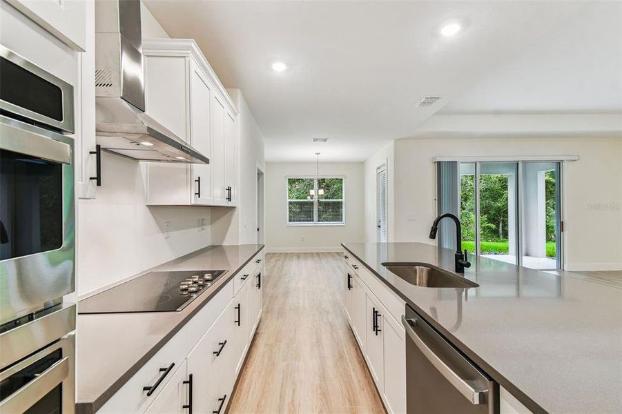 Furnished interior view inside a new home in Hidden Ridge, New Port Richey (Image 6).
