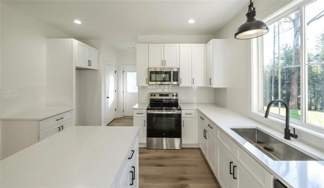 Furnished interior view inside a new home in , Lindale (Image 11).