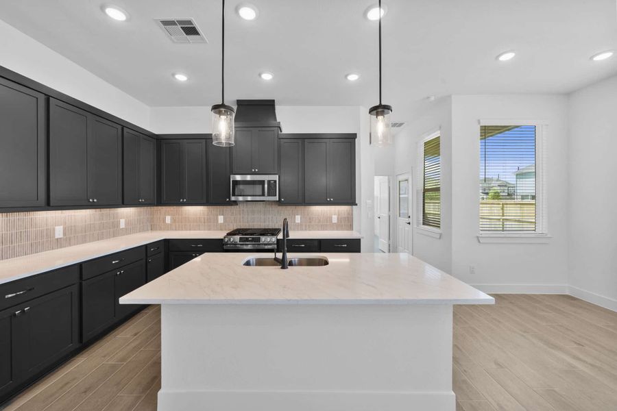 Furnished interior view inside a new home in Meridiana, Manvel (Image 7).