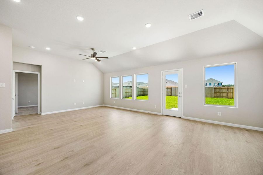 Living Room in the Sabine home plan by Trophy Signature Homes – REPRESENTATIVE PHOTO