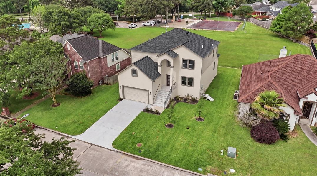Front exterior of a new home in , Houston, TX, highlighting curb appeal (Image 19).