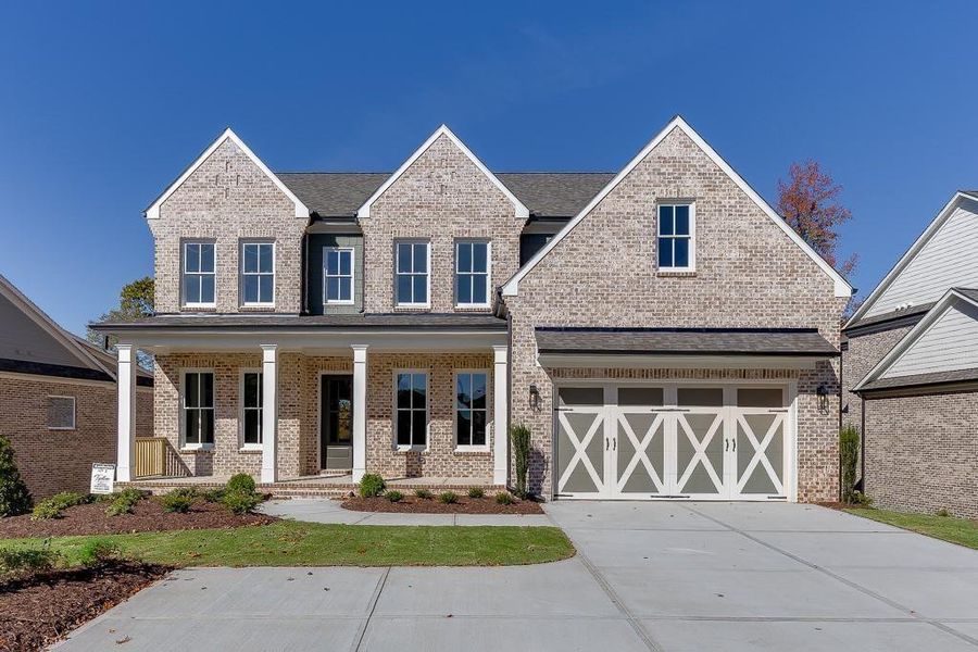 Front exterior of a new home in , Buford, GA, highlighting curb appeal (Image 1). Front exterior of a new home in , Buford, GA, highlighting curb appeal (Image 1).