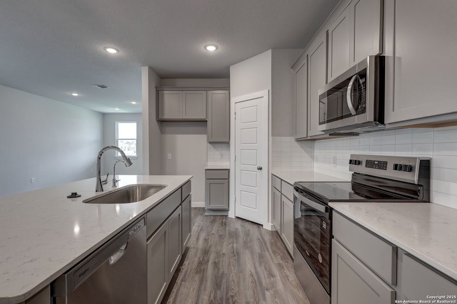 Furnished interior view inside a new home in Cinco Lakes, San Antonio (Image 7).