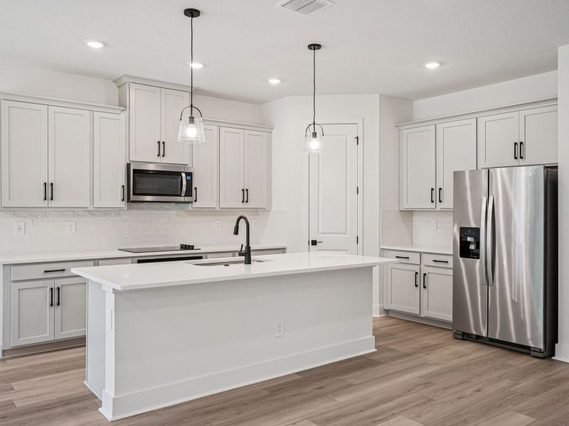 Furnished interior view inside a new home in Ridgehaven - Signature Series, Ormond Beach (Image 3).