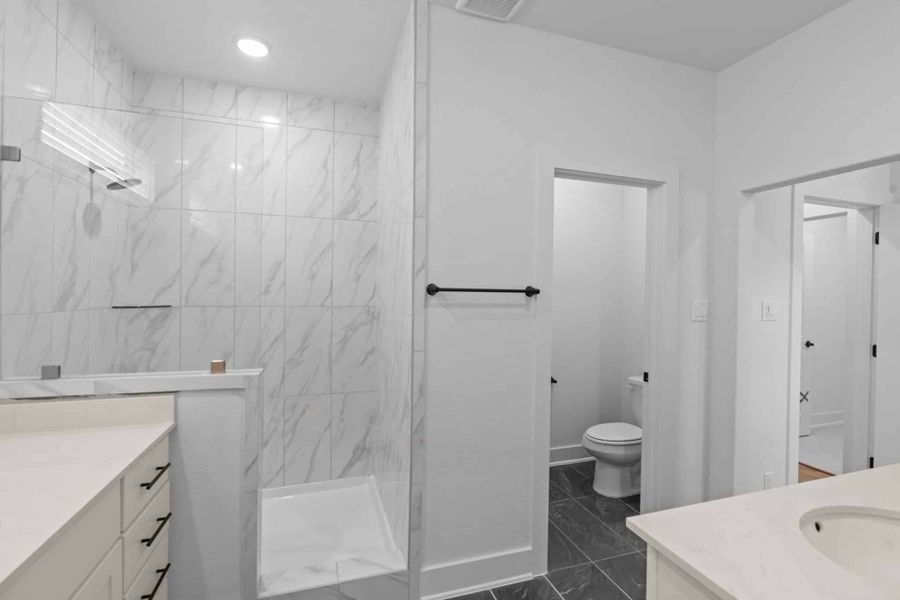 Representative furnished interior of a home built from the Balder by Chesmar Homes in Centero at Stone Oak, San Antonio (Image 7).