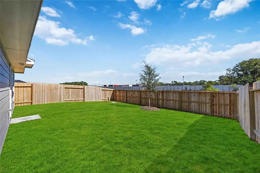 Exterior details and patio area of a home in Legacy Village, Houston (Image 3).