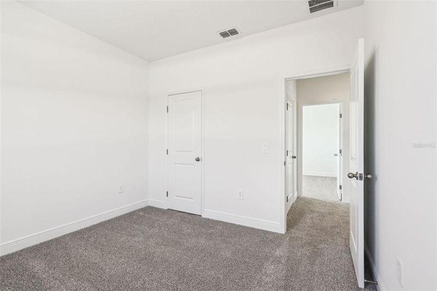 Spacious, unfurnished interior of a new home in Cyrene at Minneola - Villas, Minneola (Image 13).