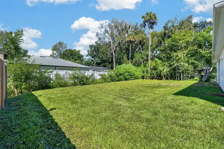 Exterior details and patio area of a home in , New Smyrna Beach (Image 23).