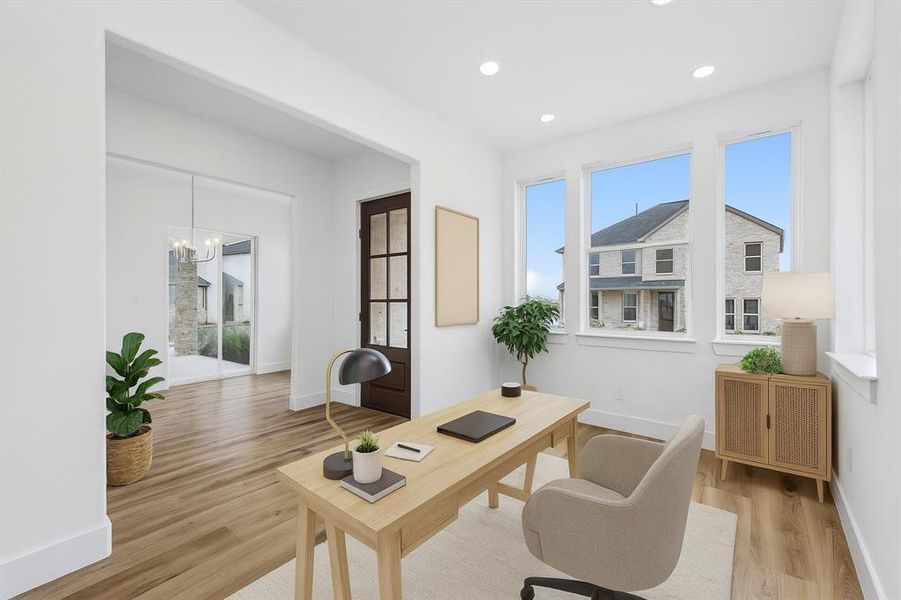 Home office featuring light wood finished floors, a chandelier, and recessed lighting virtually staged