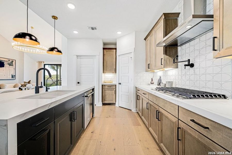 Furnished interior view inside a new home in Nopal Valley, San Antonio (Image 40).