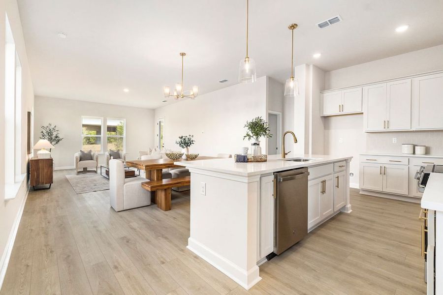 Representative furnished interior of a home built from the Zion - Waterway by Ashton Woods in Blue Heron Retreat, Little River (Image 10).