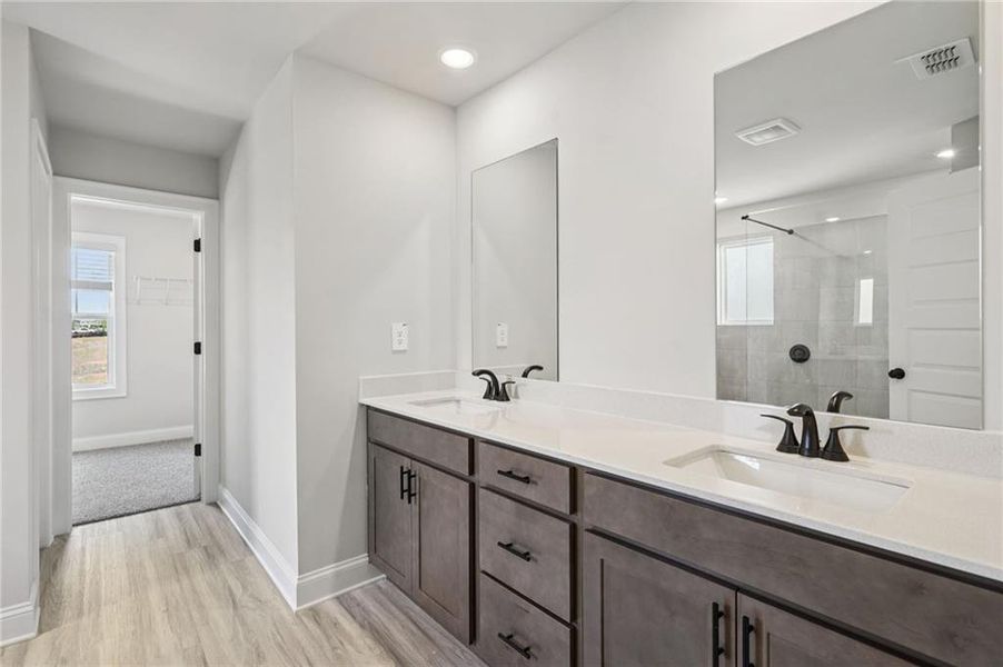 Furnished interior view inside a new home in Martin Springs - Estate Series, Lawrenceville (Image 14).