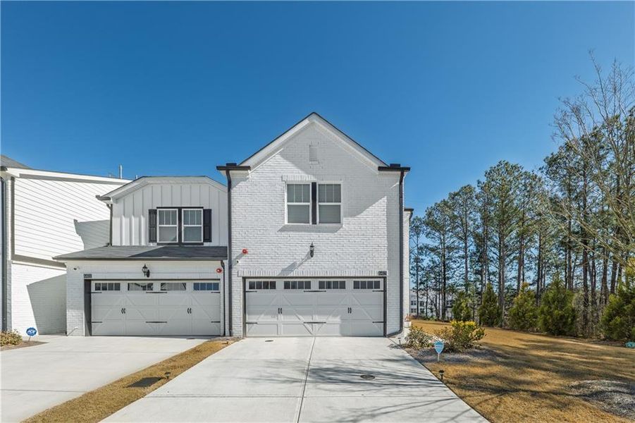 Front exterior of a new home in , Smyrna, GA, highlighting curb appeal (Image 22).
