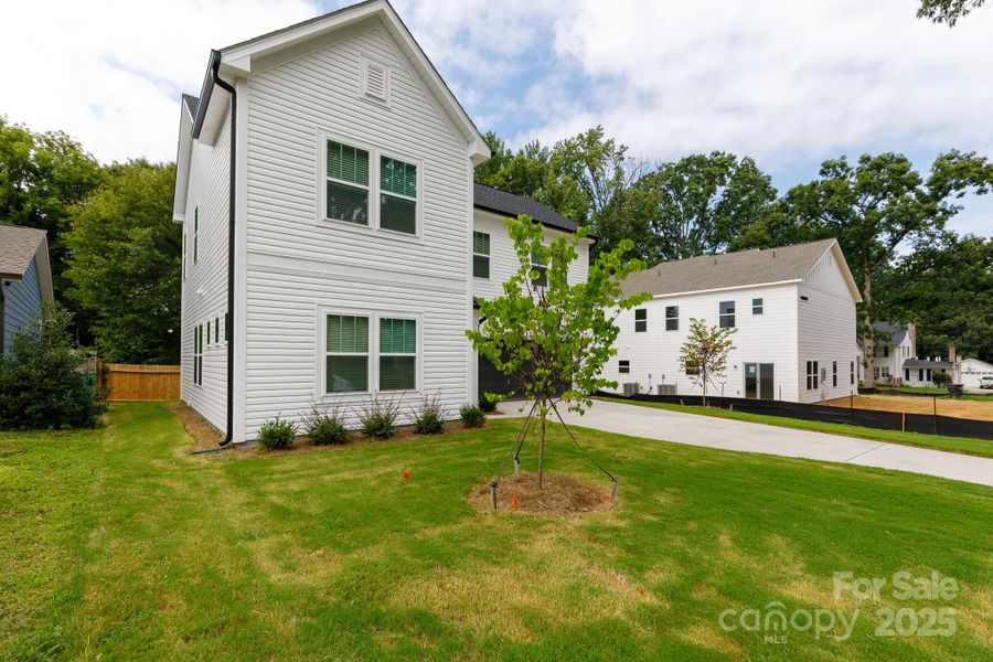 Front exterior of a new home in , Charlotte, NC, highlighting curb appeal (Image 18).