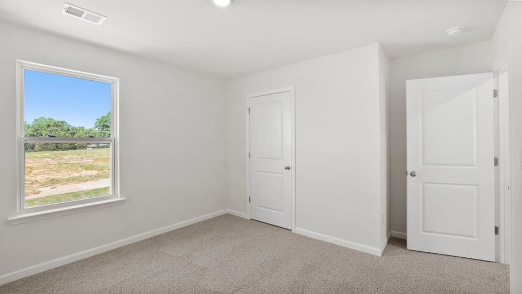 Spacious, unfurnished interior of a new home in Durbin Meadows Traditions, Fountain Inn (Image 29).