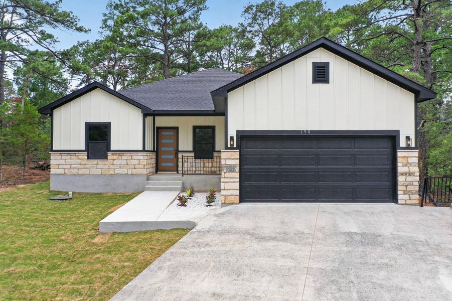 Front exterior of a new home in , Bastrop, TX, highlighting curb appeal (Image 1). Front exterior of a new home in , Bastrop, TX, highlighting curb appeal (Image 1).
