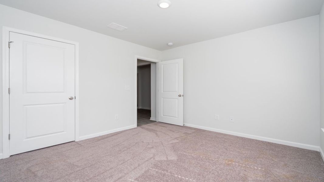 Representative unfurnished interior of a home built from the ARIA by D.R. Horton in Stanbury Creek, Supply (Image 11).