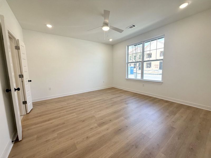 Spare room with recessed lighting, light wood-style floors, and ceiling fan
