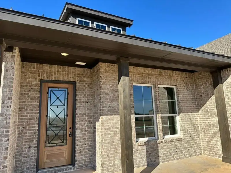 Exterior details and patio area of a home in , Leonard (Image 6).