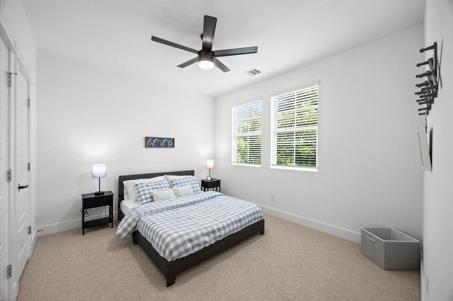 Secondary bedroom located on the second floor with jack & jill bathroom. Secondary bedroom located on the second floor with jack & jill bathroom.