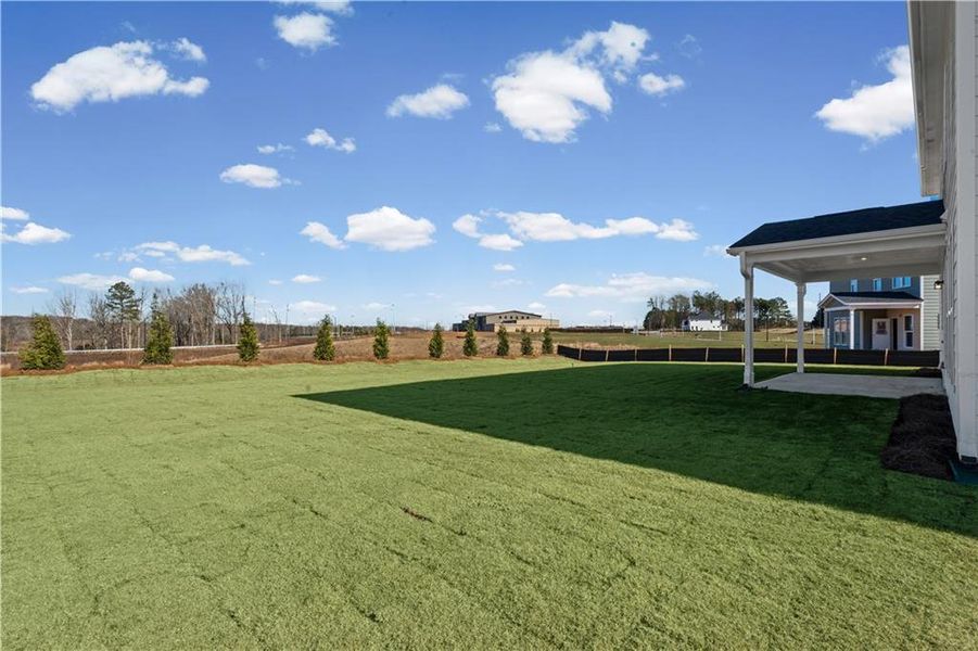 Exterior details and patio area of a home in Creekside at Skelton, Jefferson (Image 4).