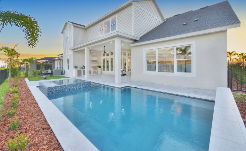 Exterior details and patio area of a home in Waterset, Apollo Beach (Image 20).