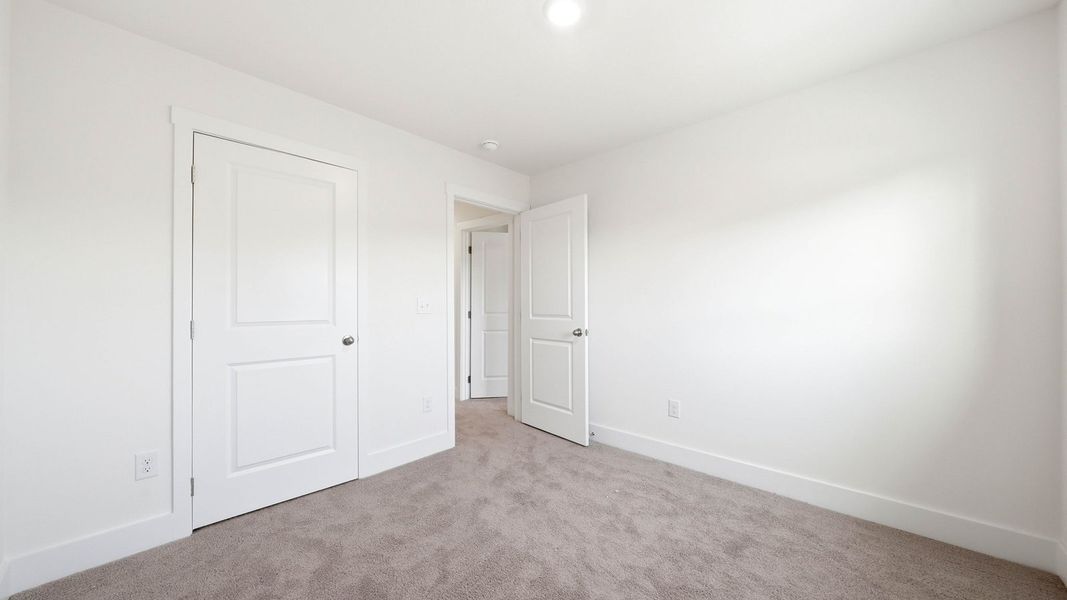 Spacious, unfurnished interior of a new home in Macon Townhomes, Seymour (Image 19).