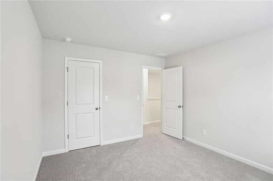 Spacious, unfurnished interior of a new home in Westmont Preserve, Powder Springs (Image 42).
