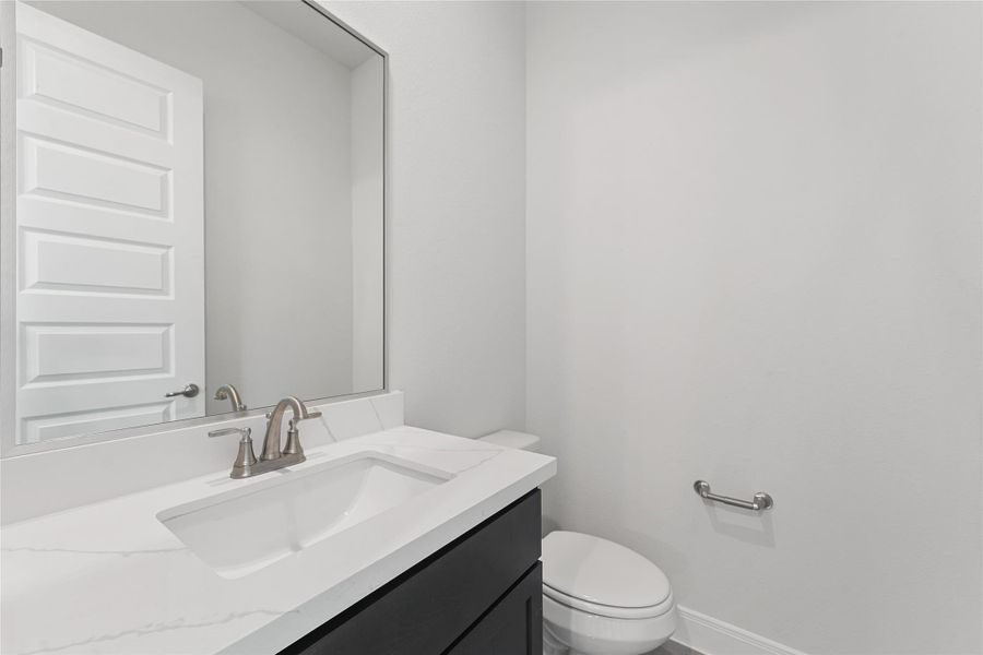 Furnished interior view inside a new home in The Corner At Buffalo Pointe, Houston (Image 27).