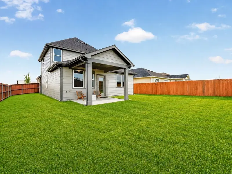 Exterior details and patio area of a home in Heartland, Crandall (Image 3).