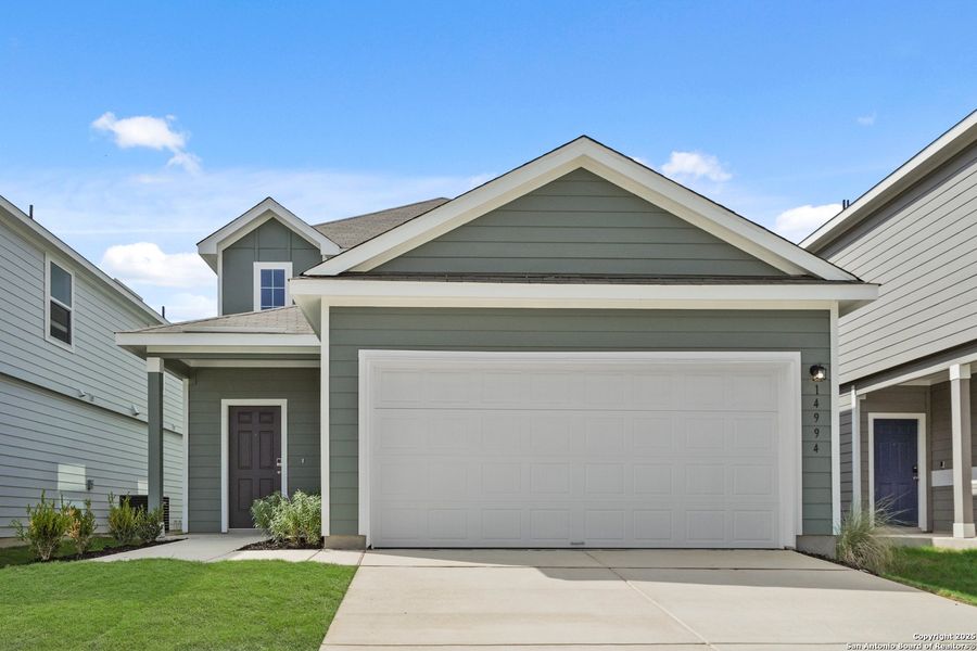 Front exterior of a new home in Timber Creek, San Antonio, TX, highlighting curb appeal (Image 16). Front exterior of a new home in Timber Creek, San Antonio, TX, highlighting curb appeal (Image 16).