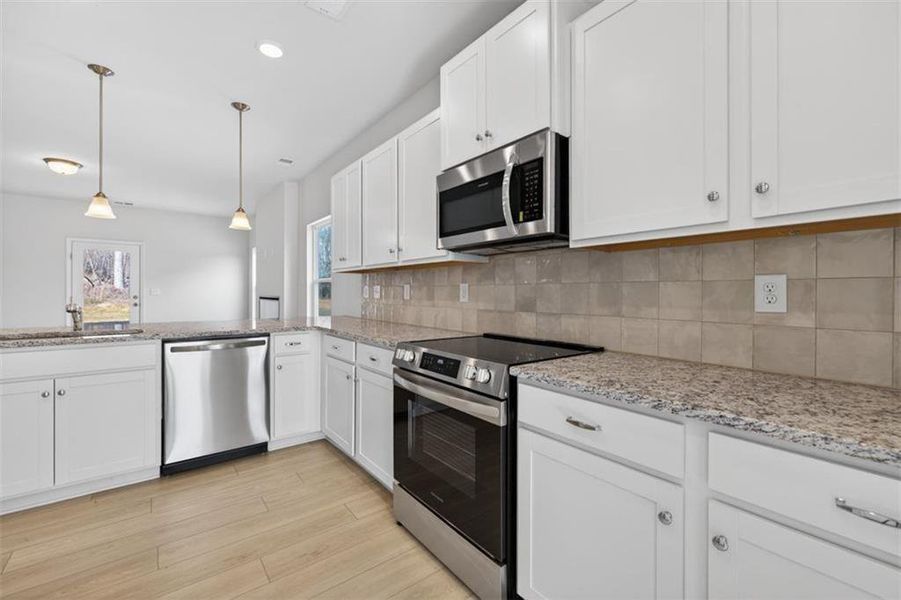 Furnished interior view inside a new home in Allen Manor, Hoschton (Image 5).