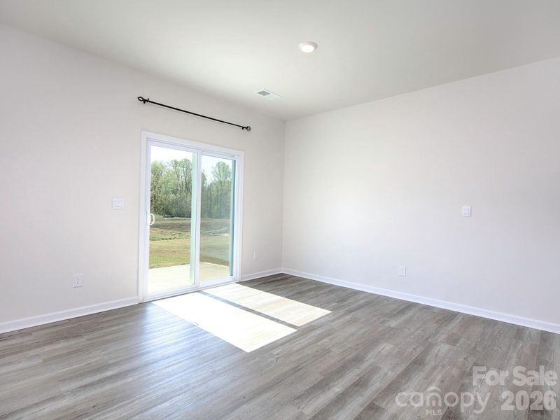 Spacious, unfurnished interior of a new home in Villas at Sherrills Ford, Terrell (Image 24).