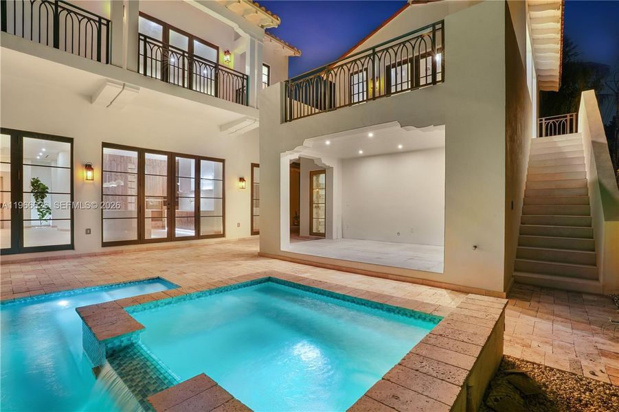 Exterior details and patio area of a home in , Coral Gables (Image 24).